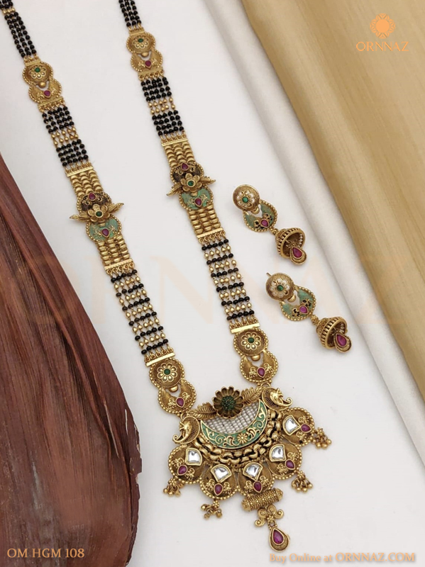 Gold mangalsutra with earrings on sale design